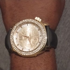 Gold wrist watch with real diamonds